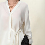 Elegant Beige Tencel-Linen V-Neck Vacation Blouse with Asymmetric Waist Tie - Fluid Silky Texture for Women