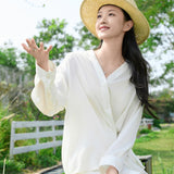 Elegant Beige Tencel-Linen V-Neck Vacation Blouse with Asymmetric Waist Tie - Fluid Silky Texture for Women