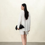 Elegant Beige Tencel-Linen V-Neck Vacation Blouse with Asymmetric Waist Tie - Fluid Silky Texture for Women