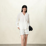 Elegant Beige Tencel-Linen V-Neck Vacation Blouse with Asymmetric Waist Tie - Fluid Silky Texture for Women